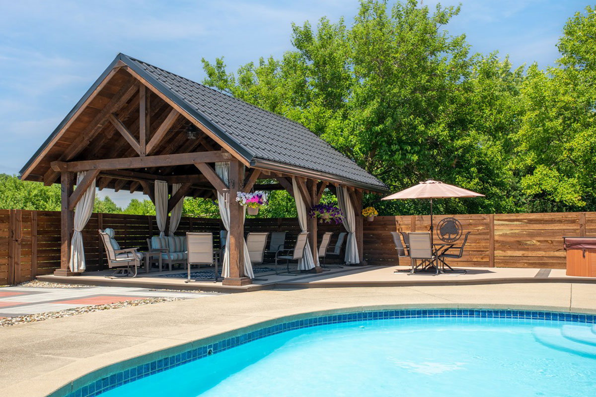 timber frame pavilion poolside close